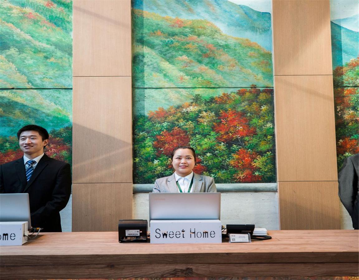 Qiu Guo Hotel Hua Mao Chaoyang  Bagian luar foto