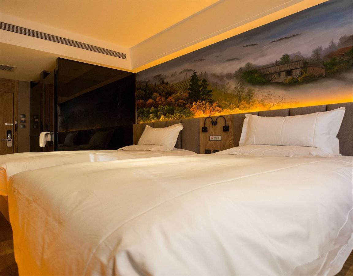 Qiu Guo Hotel Hua Mao Chaoyang  Bagian luar foto