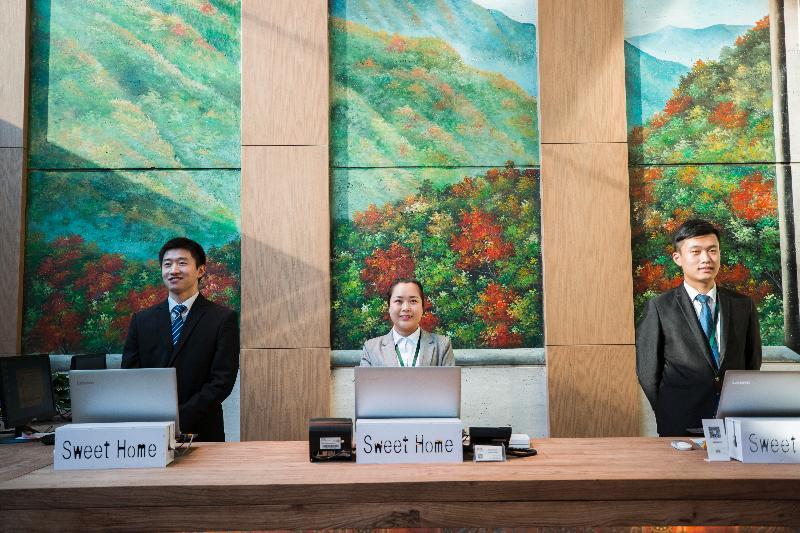Qiu Guo Hotel Hua Mao Chaoyang  Bagian luar foto
